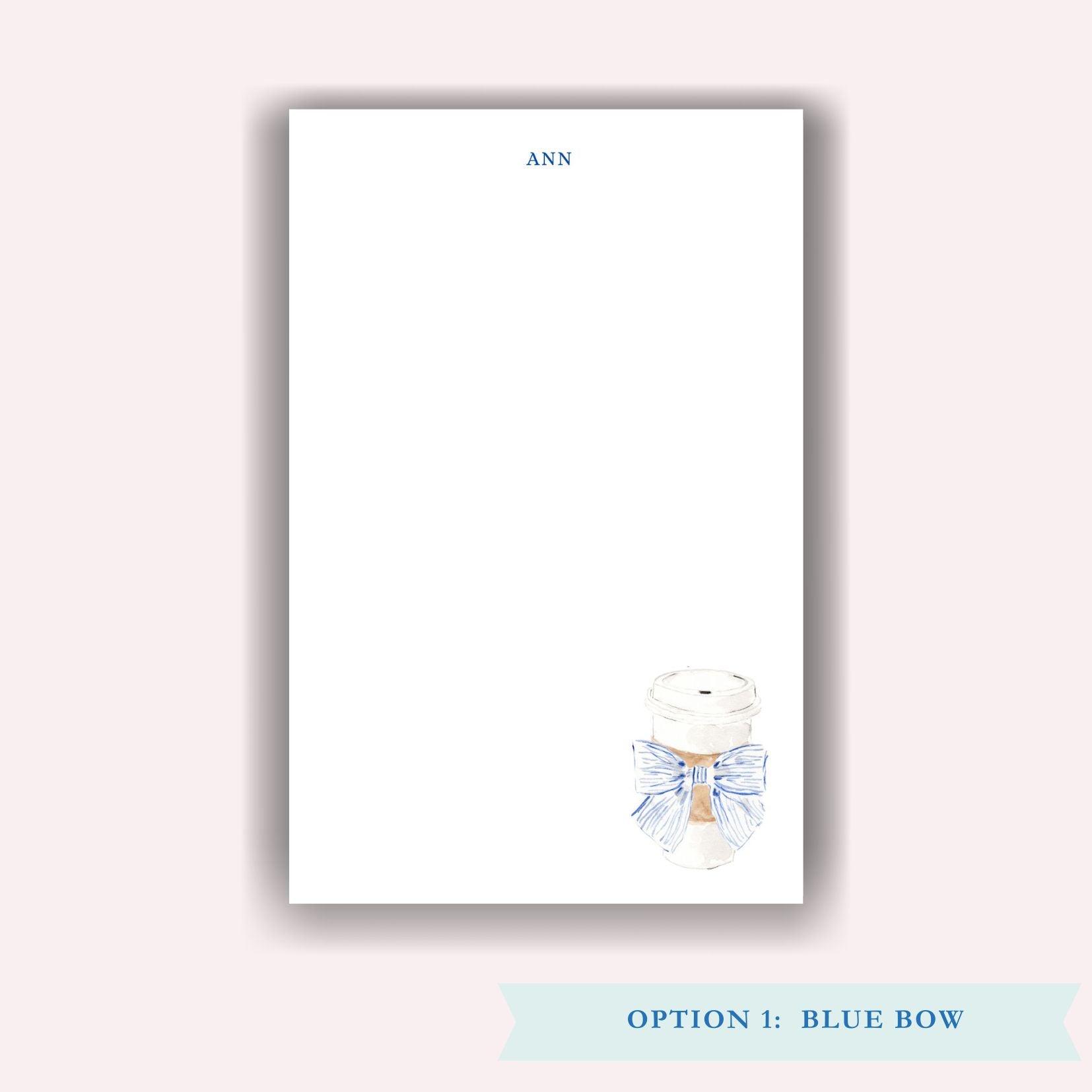 Hot Coffee with Blue Bow on Notepad