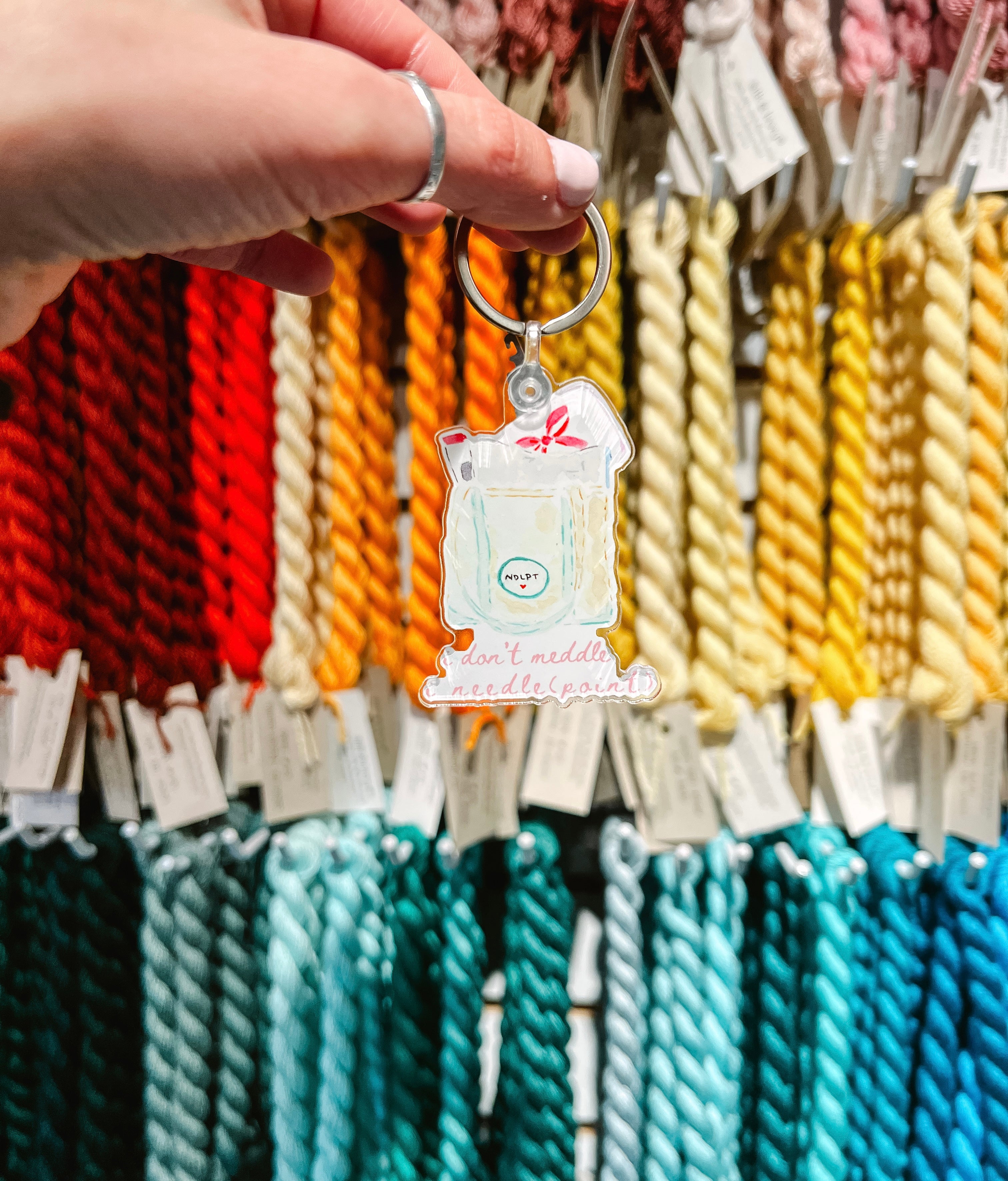 Stash bag keychain with detachable needle threader for needlepoint"