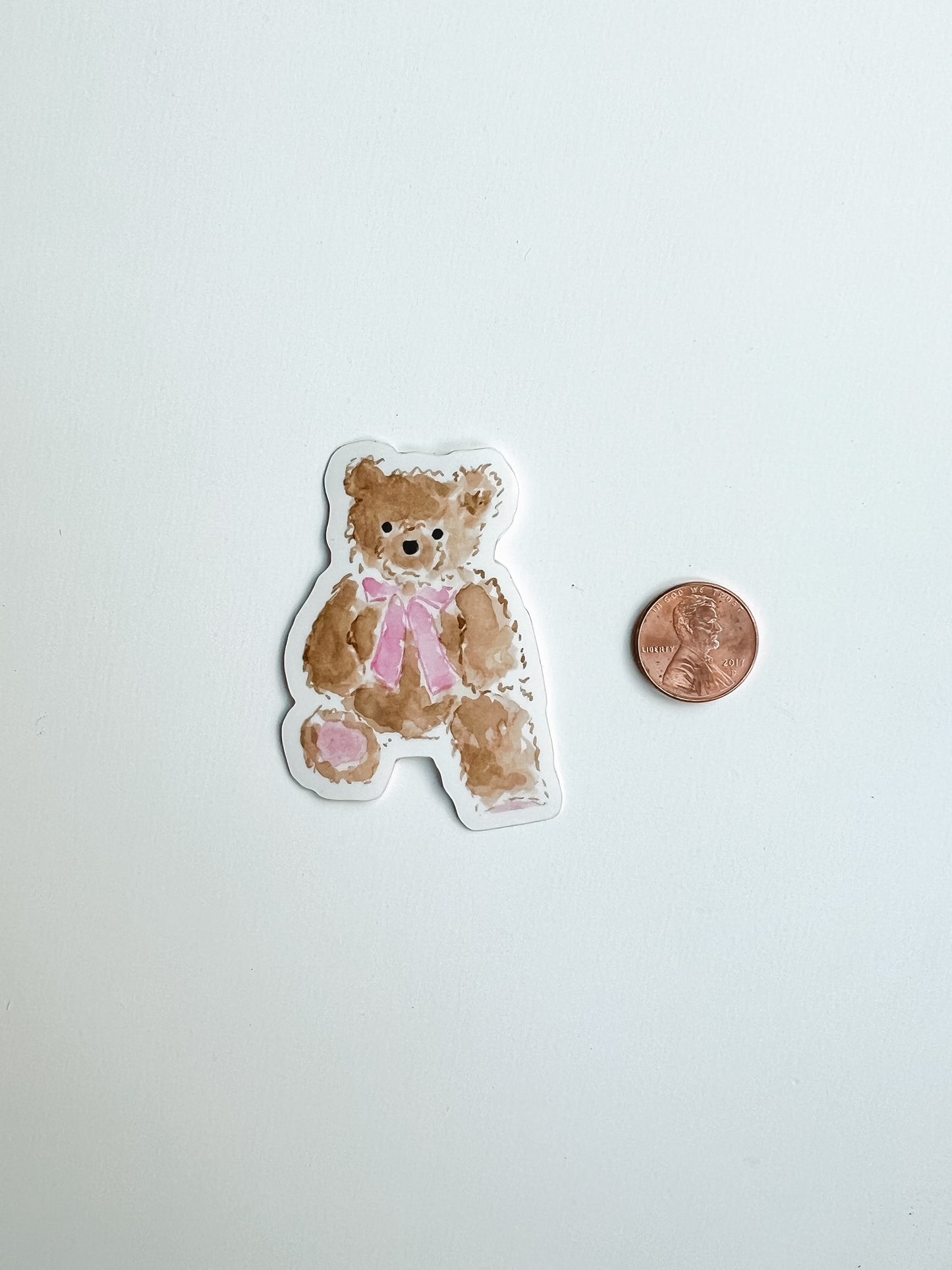 Watercolor teddy bear sticker with pink bow